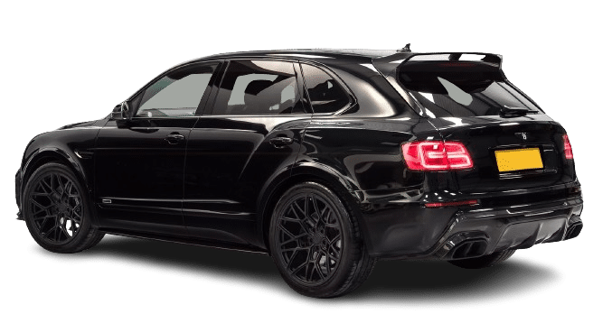 A black luxury SUV with tinted windows and sleek styling is seen from a rear three-quarter angle. The SUV has a visible custom exhaust system and a high rear spoiler, ready for hire.